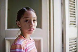 Doors Prints: Portrait of a girl standing in a room