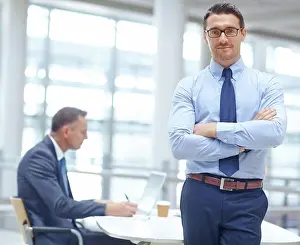 Smart Prints: Portrait, growth and mindset with a business man in his office standing arms crossed in a confident pose