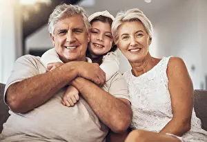 Portrait, happy family or grandparents hug a girl in living room bonding in Australia with love