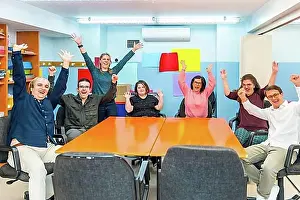 Disability Prints: Portrait of happy joyful people with special needs in a class with teacher