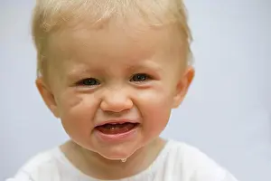 Attentive Prints: Portrait of a laughing 10 month old baby girl