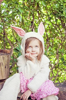 Hood Prints: Portrait of little girl wearing Easter bunny costume