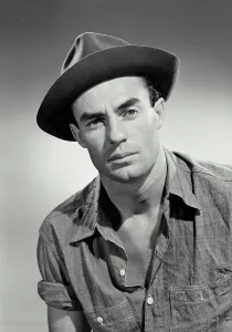 Shoulders Prints: Portrait of man in button shirt and hat smiling