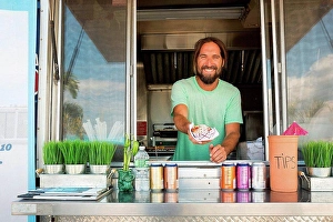 Upper Body Prints: Portrait of man in fast food trailer