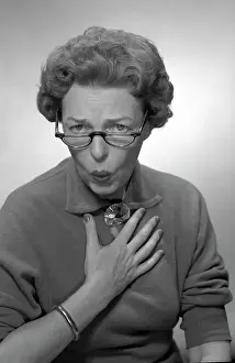 Facial Expression Prints: Portrait of mature woman making a face