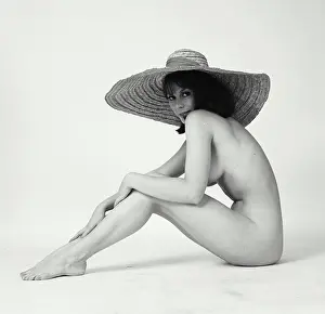 Medium Length Prints: Portrait of a nude young woman wearing a sunhat