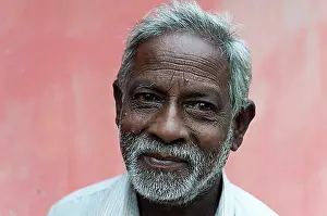 Looks Into The Camera Prints: Portrait of an old Tamil man with a gray beard