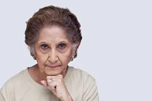 Colored Background Prints: Portrait of serious old woman