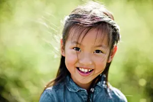 Denim Prints: Portrait of Seven Year Old Asian Girl in Field in San Diego