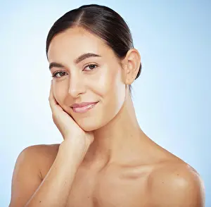 Promote Prints: Portrait, skincare and beauty with a model woman in studio on a blue background for natural treatment