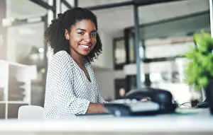 Expert Prints: Portrait, smile and black woman in business office or secretary in creative startup