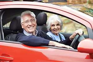Retirement Prints: Portrait Of Smiling Senior Couple Out For Drive In Car