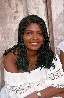 Salvador Prints: Portrait of a smiling woman with braided hair in Salvador, Brazil, South America