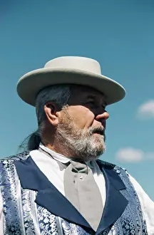 Headgear Prints: A portrait of a tour guide at a museum