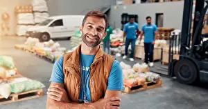 Kindness Prints: Portrait, volunteer and man with arms crossed