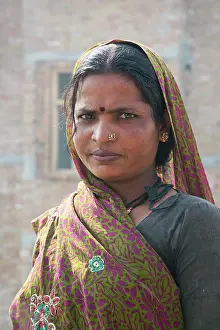 Hard Work Prints: Portrait of a woman labourer working in an urban construction site