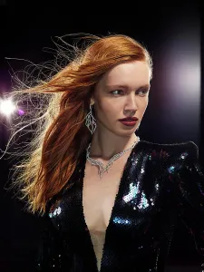 Glamorous Prints: Portrait of a woman with light flares and wind