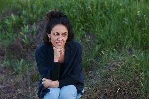 People In Nature Prints: Portrait of a woman sitting in the field at sunset