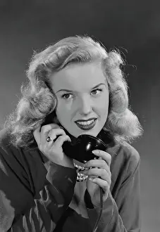 Using Phone Prints: Portrait of woman talking on phone