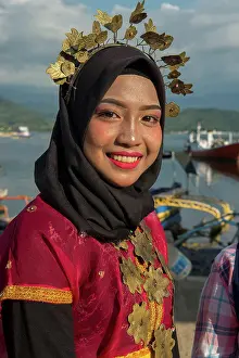 Muslim Prints: Portrait of a young Bajau woman at a traditional dance performance on Bungin Island