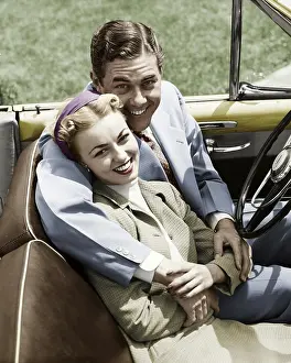 Shirt And Tie Prints: Portrait of young couple sitting in convertible car