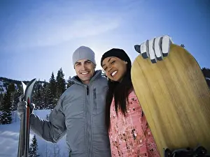 Doors Prints: Portrait of a young couple skiing