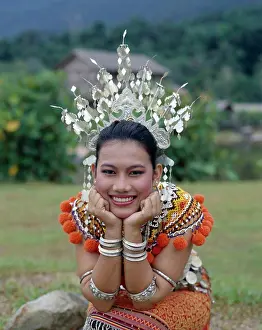 One Young Woman Only Prints: Portrait of a young Iban woman dressed in a traditional costume, Sarawak, Malaysia