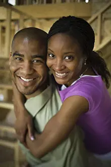 Straight Prints: Portrait of a young woman embracing a young man from behind