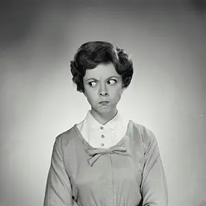 One Young Woman Only Prints: Portrait of young woman making face