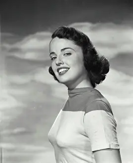 Medium Length Hair Prints: Portrait of a young woman smiling