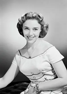 Medium Length Hair Prints: Portrait of young woman smiling