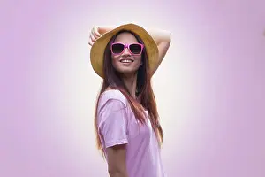 Beautiful Woman Prints: Portrait of young woman wearing hat and sunglasses