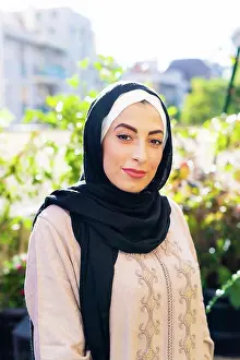 Bame Prints: Portrait of young woman wearing hijab outdoors