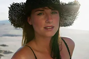 Sseditor Aa Prints: Portrait of a young woman wearing a straw hat