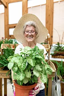 Elderly Prints: Positive elderly woman in hat