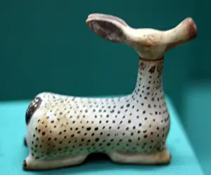 Deer Prints: Pottery bottle shaped as a female deer for perfume