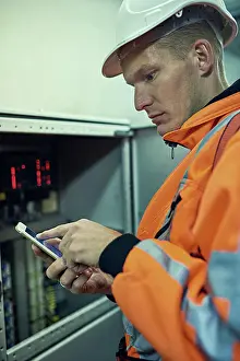 Maintenance Prints: Power, phone and man in electricity maintenance