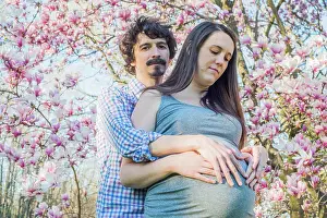 Maternity Prints: Pregnancy Portrait in the Park during cherry blossoms
