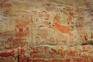 Cave Prints: Prehistoric rock art, paintings on sheltered cliff face La Lindosa, Colombia