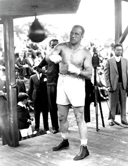 Boxer Prints: Preparing To Move Man MountainJack Sharkey punching the bag at Orangeburg