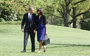 President Barack Obama and First Lady Michelle Obama arrive at the White House on April 18, 2013