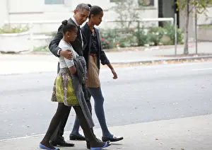 Daughters Prints: President Barack Obama walks from St John's Episcopal Church to the White House on October 28