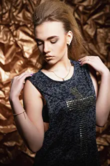 Pensive Prints: Pretty young blonde posing in the studio