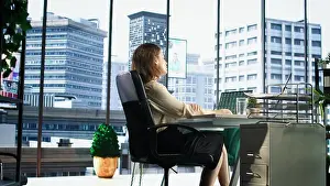 Analysis Prints: Professional female leader evaluating trading risks before making a huge investment