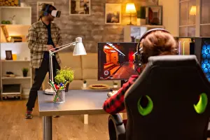 Electronic Prints: Professional video gamer female playing an online shooter game