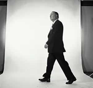 Business Suit Prints: Side profile of businessman walking