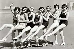 Only Women Prints: Side profile of a group of young women dancing on a beach