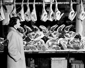 Meat Prints: Side profile of a young woman shopping in a butcher's shop