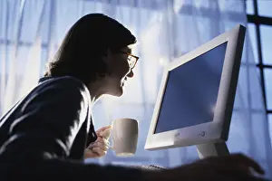 Refreshment Prints: Side profile of a young woman using a computer