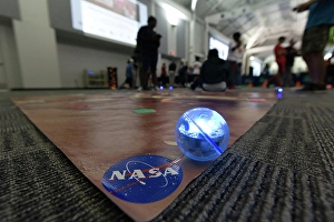 Robotics Prints: A programmable off-the-shelf Sphero robot is shown on a Mars mat at the Center for Space Education at NASA's
